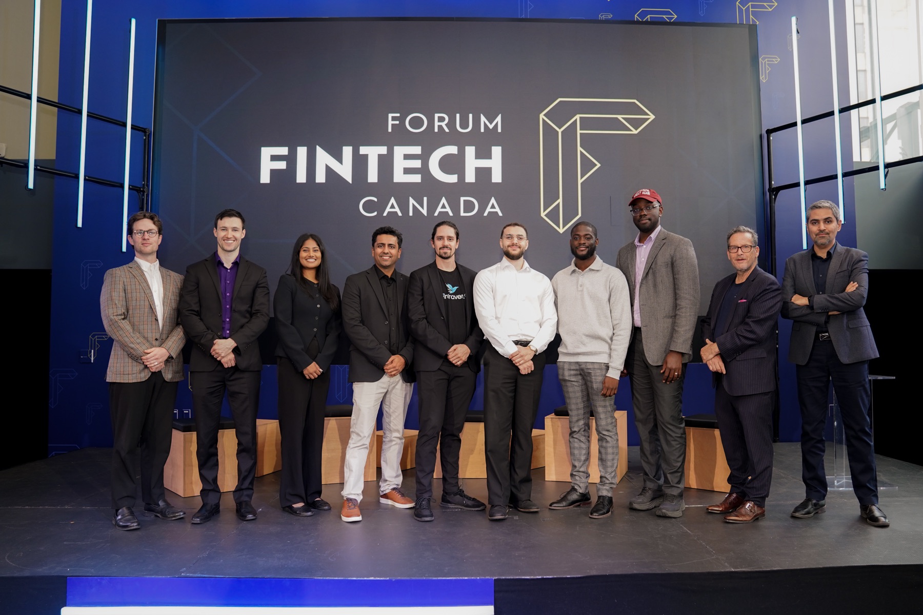 The ten pitch competition participants standing together at Forum Fintech Canada